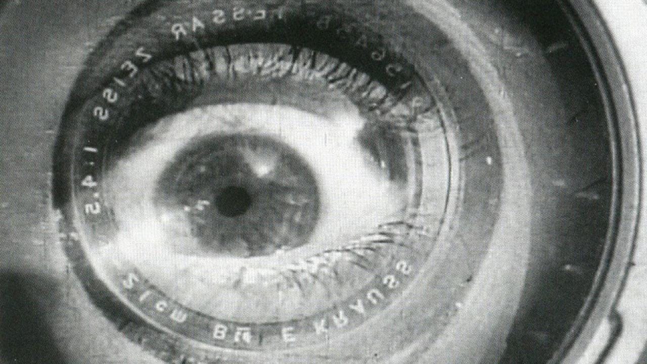 An eye superimposed on a camera lens: the kino-eye of Dziga Vertov's Man with a Movie Camera.